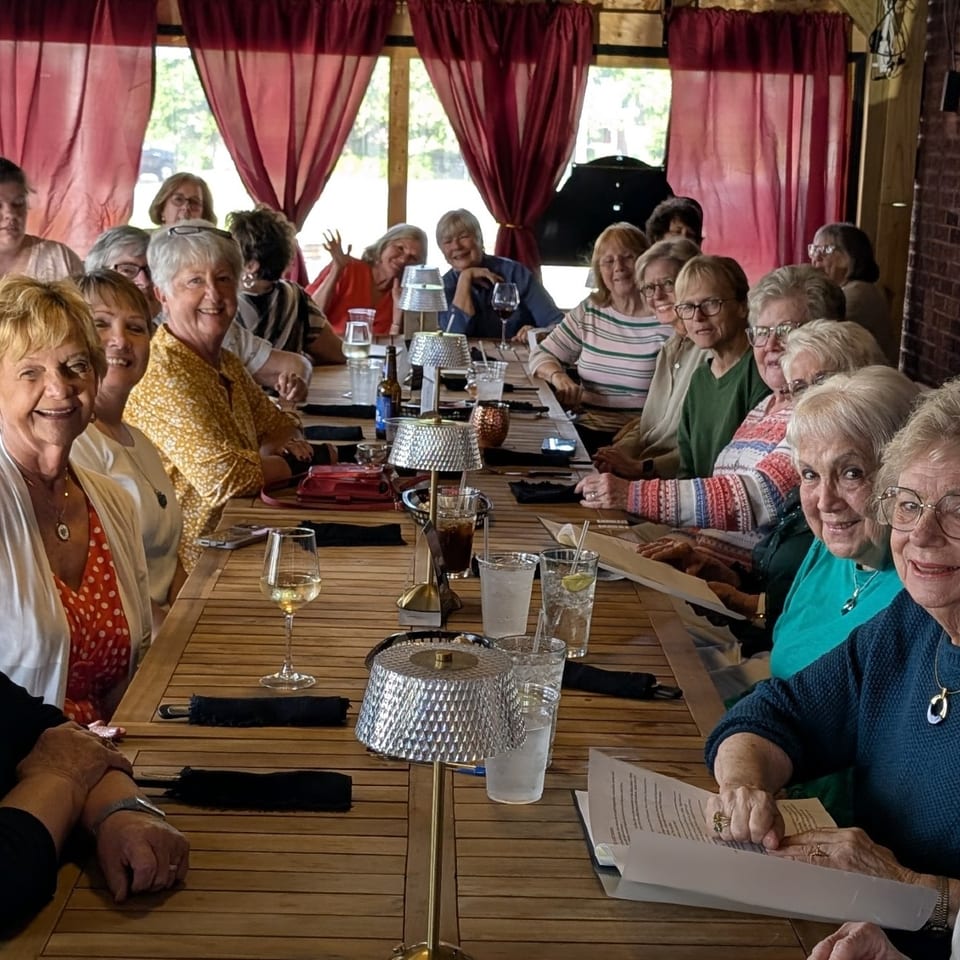 Guests sharing a long table at Stein Haus