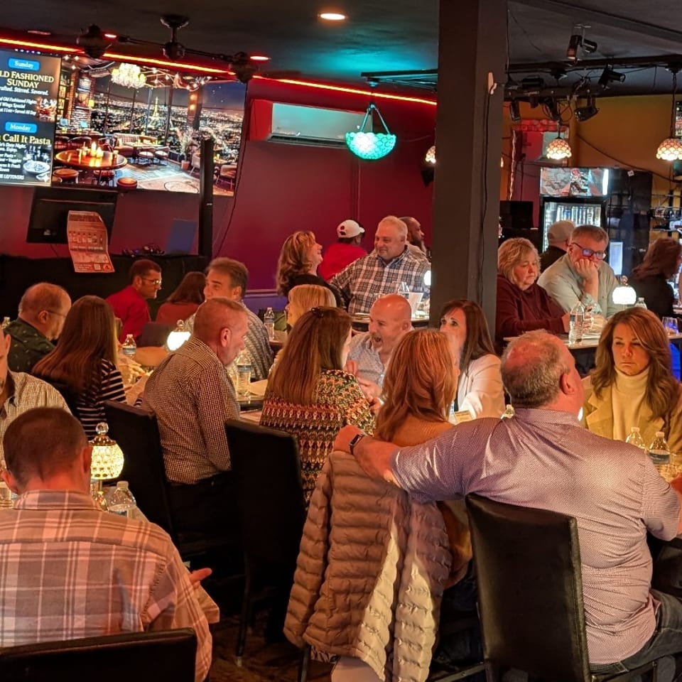 Guests dining in the Stein Haus room