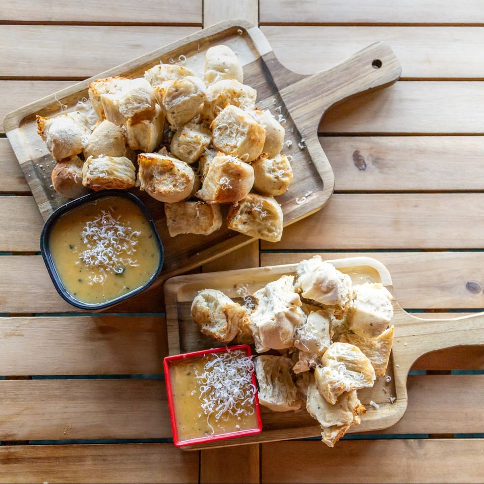 Bread bites with dipping sauces